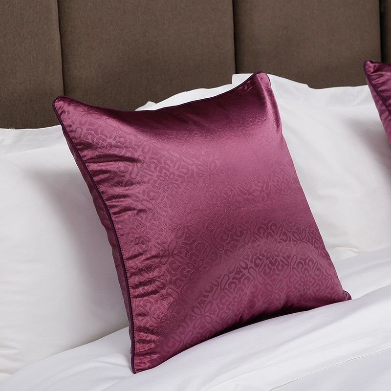 Purple embossed flower throw pillow