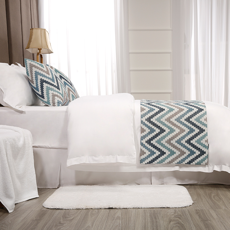 Wavy textured bed end towel